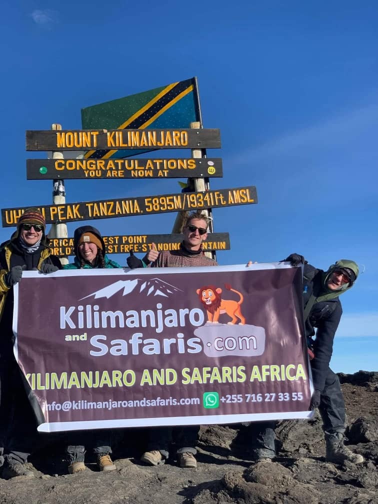 Kilimanjaro Safaris Africa clients at Uhuru Peak Kilimanjaro