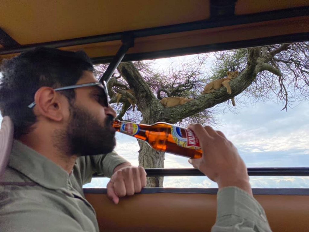 drinking beer with Climb Kilimanjaro and Tanzania Safaris with our guest in Serengeti national park