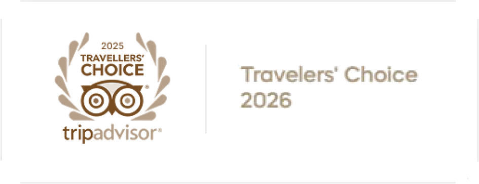 TripAdvisor Travelers' Choice 2026 badge with an owl logo and laurel leaves