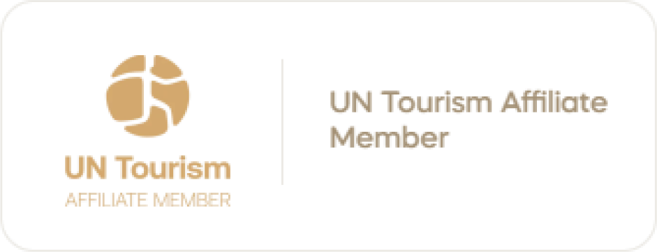 UN Tourism Affiliate Member badge with a tan globe logo on the left and the words 'UN Tourism Affiliate Member' on the right.